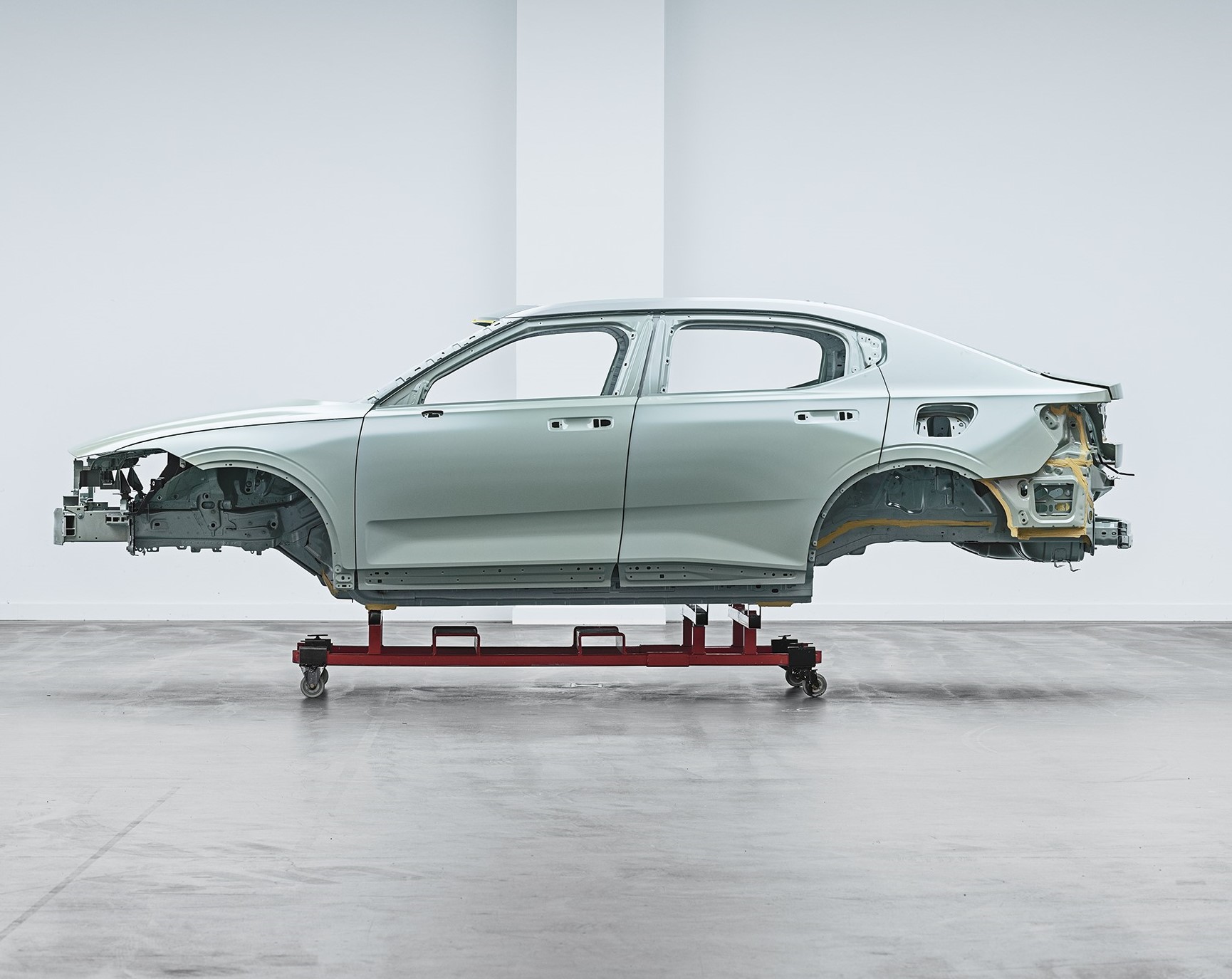 A car chassis in a factory.