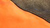 Detailed shot of vibrant orange and black fabric